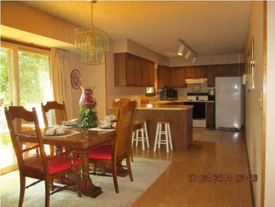 Open from living room into dining and kitchen