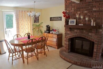 Dining area (sun filled from the west) . Wood burn