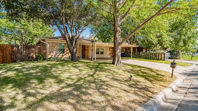 Single story home featuring a front yard