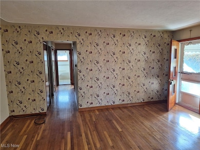 Living room entrance and hallway to Full Bath and bedrooms
