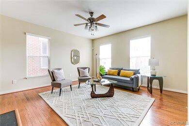 Spacious living room with hardwood floors.