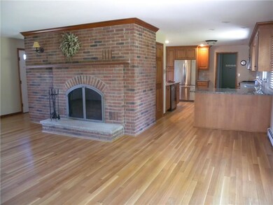 The brick fireplace adds that touch of class to th