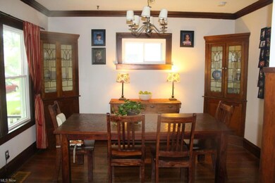 Dining room with leaded glass, built-in corner cabinets!