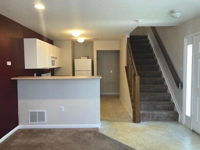 LIVING ROOM LEADING TO KITCHEN