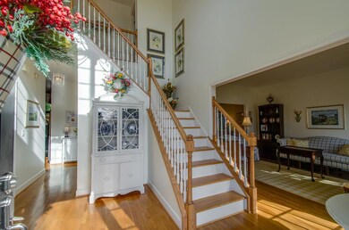 Grand foyer greets you as you enter the home.  Hardwood flooring throughout home, including the stairs.