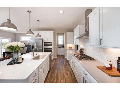 Photos of previously completed model home. Please see listing agent for home specific selections. Staged for furniture size reference.