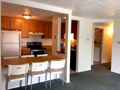 Eat in kitchen with newer oven, oak cabinets, refr