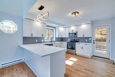 Kitchen w/ Back Entrance to Trez Deck