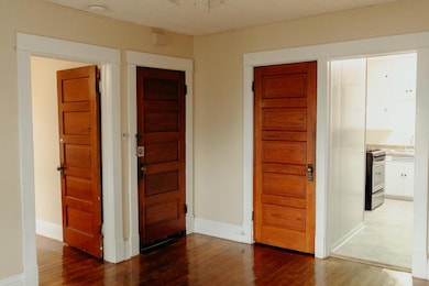 Unit 2-View of Door, Bed R, Kitchen