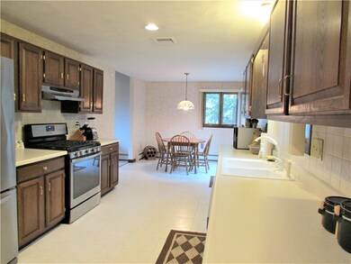 Open eat in kitchen with newer stainless steel app