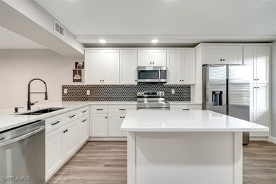 12601 Kelly Sands Way unit 402, Fort Myers, FL 33908 - photo 3