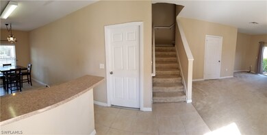 Enter into the greatroom, eat in kitchen with bar