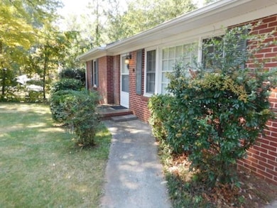 Property entrance with brick siding