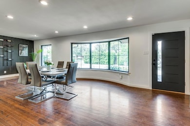 Dining room featuring dark hardwood / wood-style f