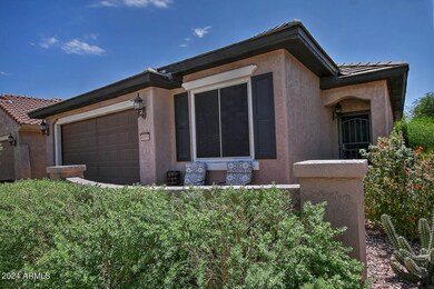 6593 W Mockingbird Ct-large-003-031-Fro