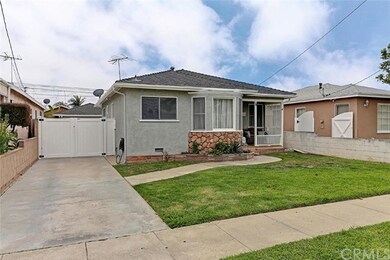 Freshly painted exterior, green grassy yard, stack