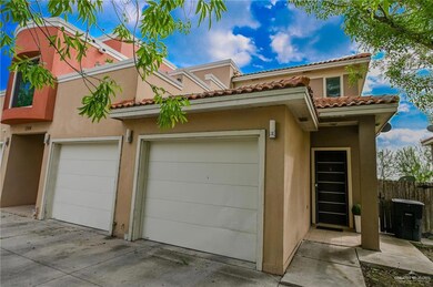 Mediterranean / spanish house featuring a garage
