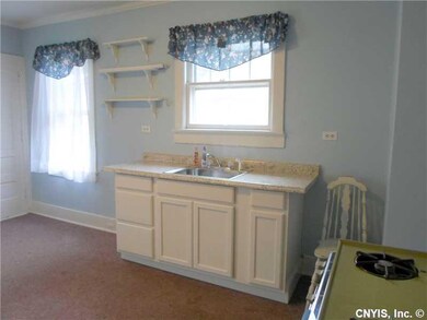 Kitchen. New cabinet, sink and counter.
