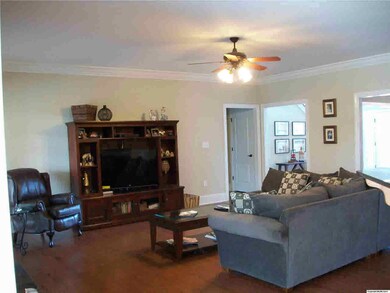 One view of the family room that also has hardwood floors.