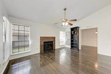 Unfurnished living room with a fireplace, wood fi