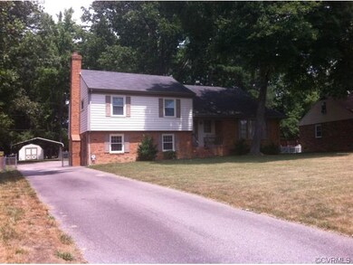 LONG PAVED DRIVE WAY INTO BACK YARD