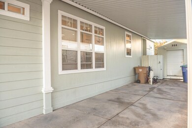 Carport with shed