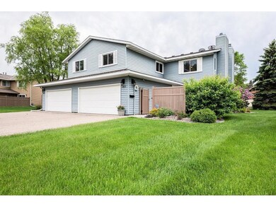 This wonderful end unit townhome has a private set