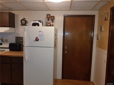 Back entrance leading to the studio apartment.