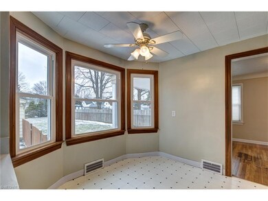 The kitchen windows overlook the fenced in yard!