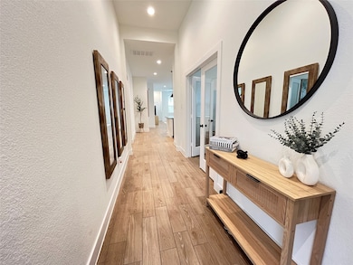 Foyer/entryway with high ceilings. Tile Floors.