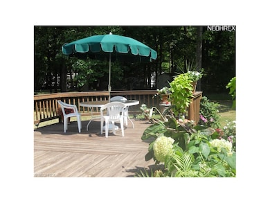 The Large Deck overlooks the Lush Landscaping and 