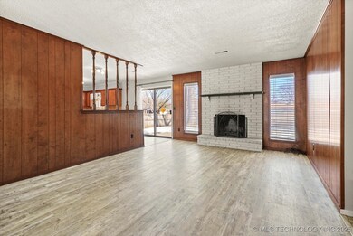 Very large living room open to the kitchen and din