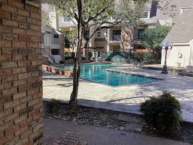 Pool with a patio area and stairs