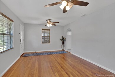 Empty room with light hardwood / wood-style floori
