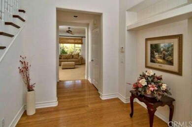 Elegant foyer with high ceilings welcomes you home.