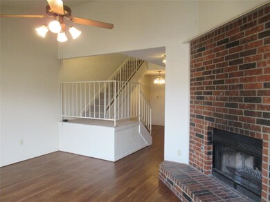 Living room open to dining and peeks through to th