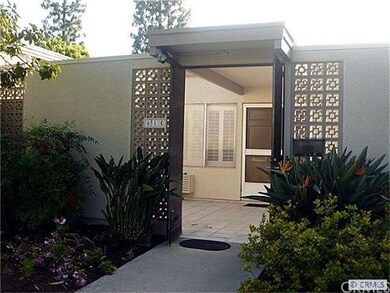 Gated doors lead to patio and front entry