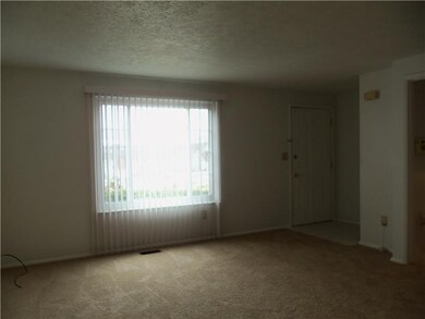 Living Room. All New Neutral Carpet throughout
