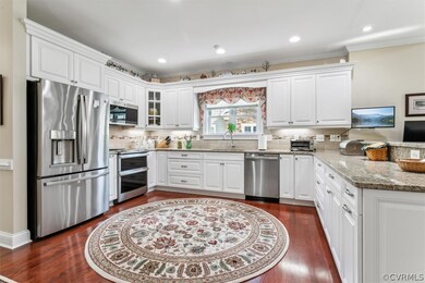 Kitchen featuring dark hardwood / wood-style floor