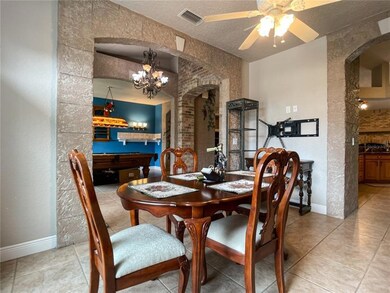 Natural flow from living and dining rooms into the kitchen