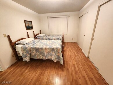 Bedroom with light wood finished floors
