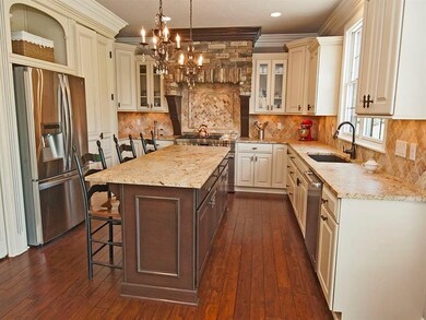 THE GOURMET KITCHEN HAS ALL THE UPGRADES TO MAKE E