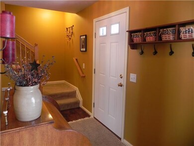 Foyer Generously sized foyer is furnished with a r