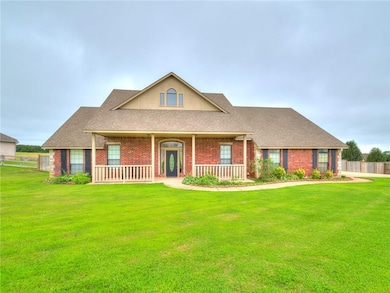 Look at that curb appeal and giant front patio!