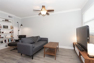 Living area featuring light wood finished floors,