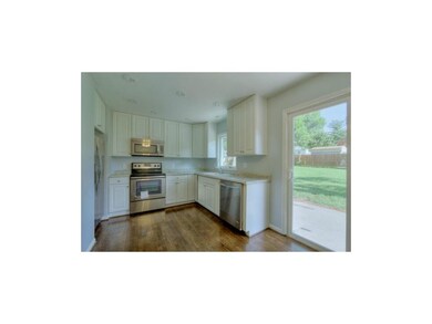 The hardwood floors flow flawlessly into the endea