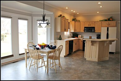 Beautiful Kitchen with new laminate flooring.
