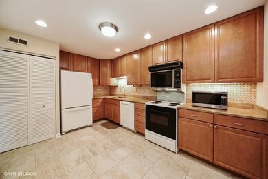 Natural light from the dining room and recessed li