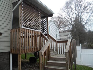 Spacious cover rear porch awaits you for your morn