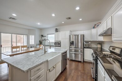 Kitchen with a sink, appliances with stainless ste